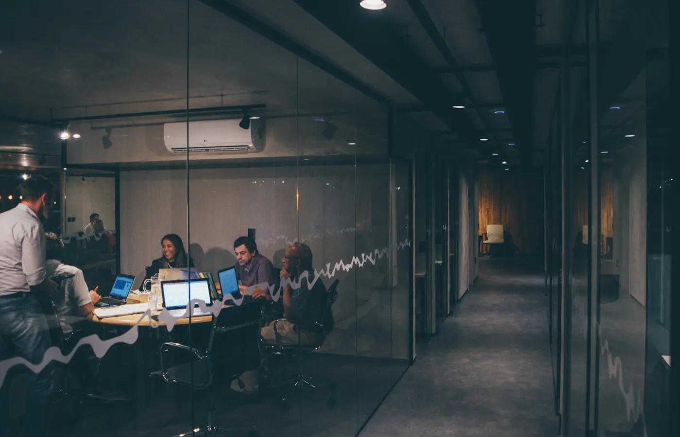 A glass-walled meeting room