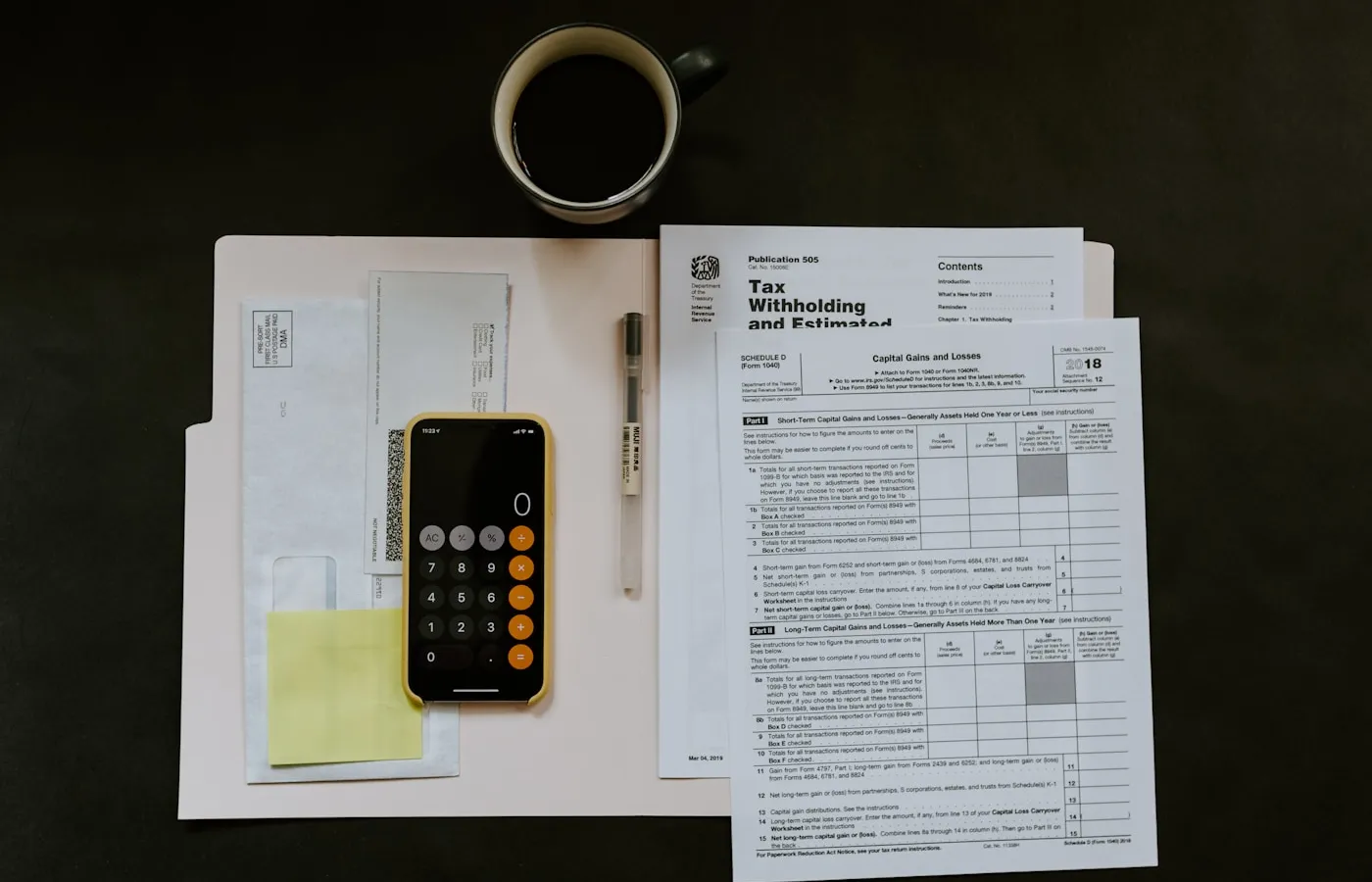 Printed company filings on a desk